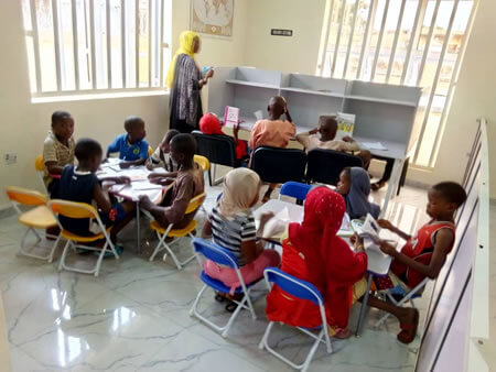 children learning at the Library
