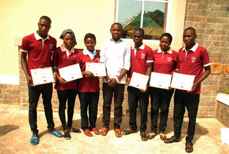 graduating students and their instructor